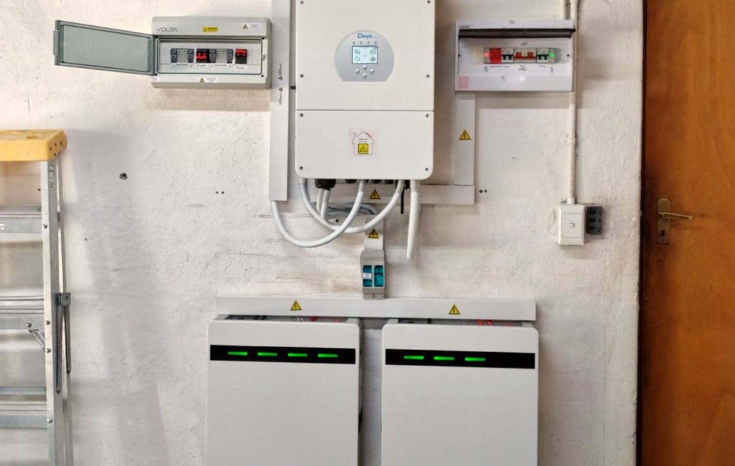 An inverter and battery installation